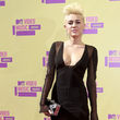 Miley Cyrus präsentierte auch einen tiefen Ausschnitt