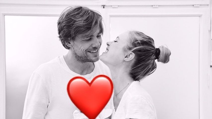 Clemens Fritz und Alena Gerber mit ihrer Tochter