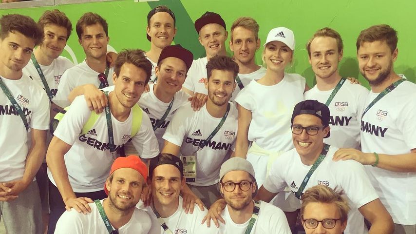 Lena Gercke und die deutsche Hockey-Nationalmannschaft
