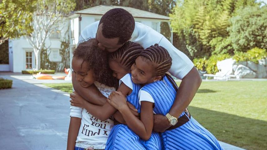 US-Rapper Sean Combs alias P. Diddy mit seinen drei Töchtern