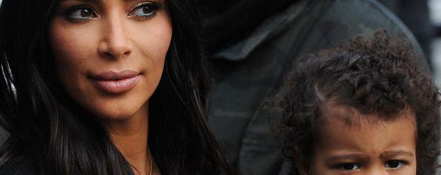 Kim Kardashian, Kanye West und ihre Tochter North West Kim Kardashian, Kanye West und ihre Tochter North West