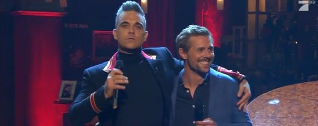 Moderator Klaas Heufer-Umlauf singt mit Megastar Robbie Williams Moderator Klaas Heufer-Umlauf singt mit Megastar Robbie Williams