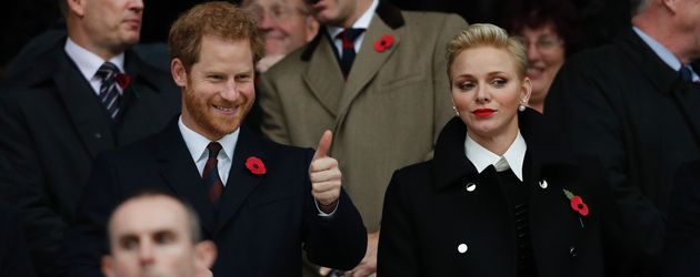 Prinz Harry und Fürstin Charlène von Monaco beim Rugbyspiel in London Prinz Harry und Fürstin Charlène von Monaco beim Rugbyspiel in London