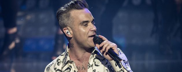 Robbie Williams bei einem Konzert in London 2016 Robbie Williams bei einem Konzert in London 2016