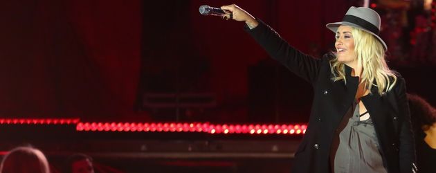Sarah Connor während ihrer vierten Schwangerschaft bei einem Konzert in Dresden Sarah Connor während ihrer vierten Schwangerschaft bei einem Konzert in Dresden